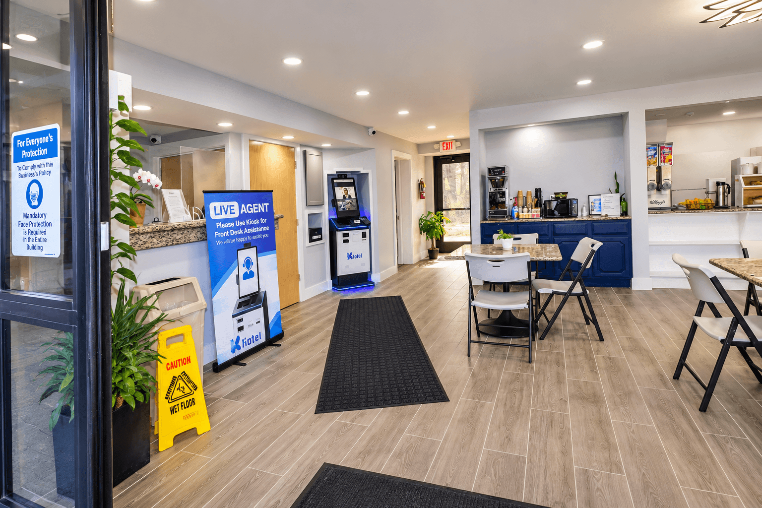 Guest using the self-service kiosk to check in at Envi Boutique Hotel